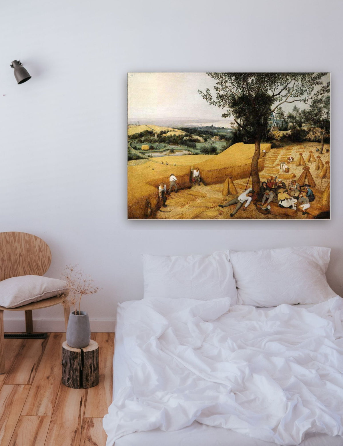 A Colheita de Trigo de Pieter Bruegel na parede de um quarto