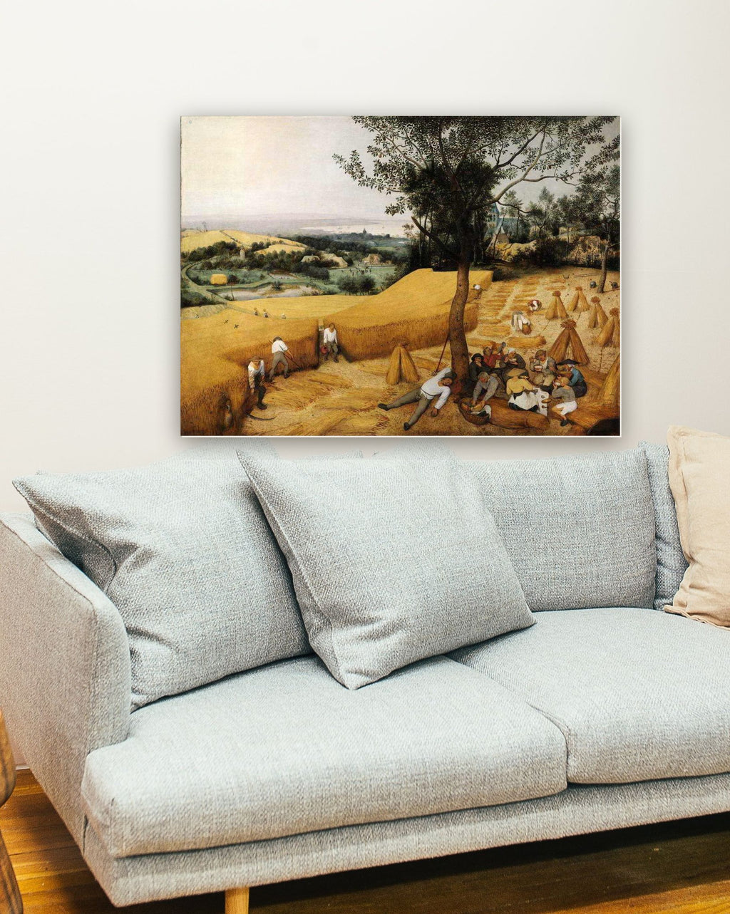 A Colheita de Trigo de Pieter Bruegel na parede de uma sala