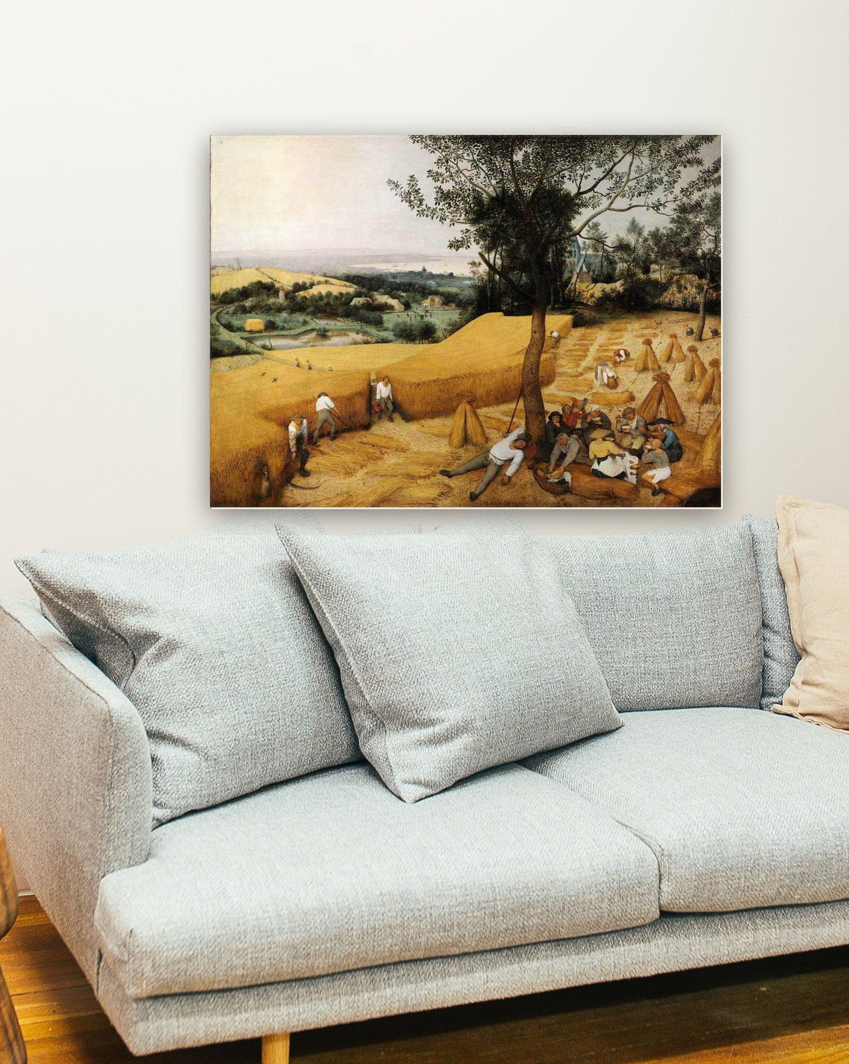 A Colheita de Trigo de Pieter Bruegel na parede de uma sala