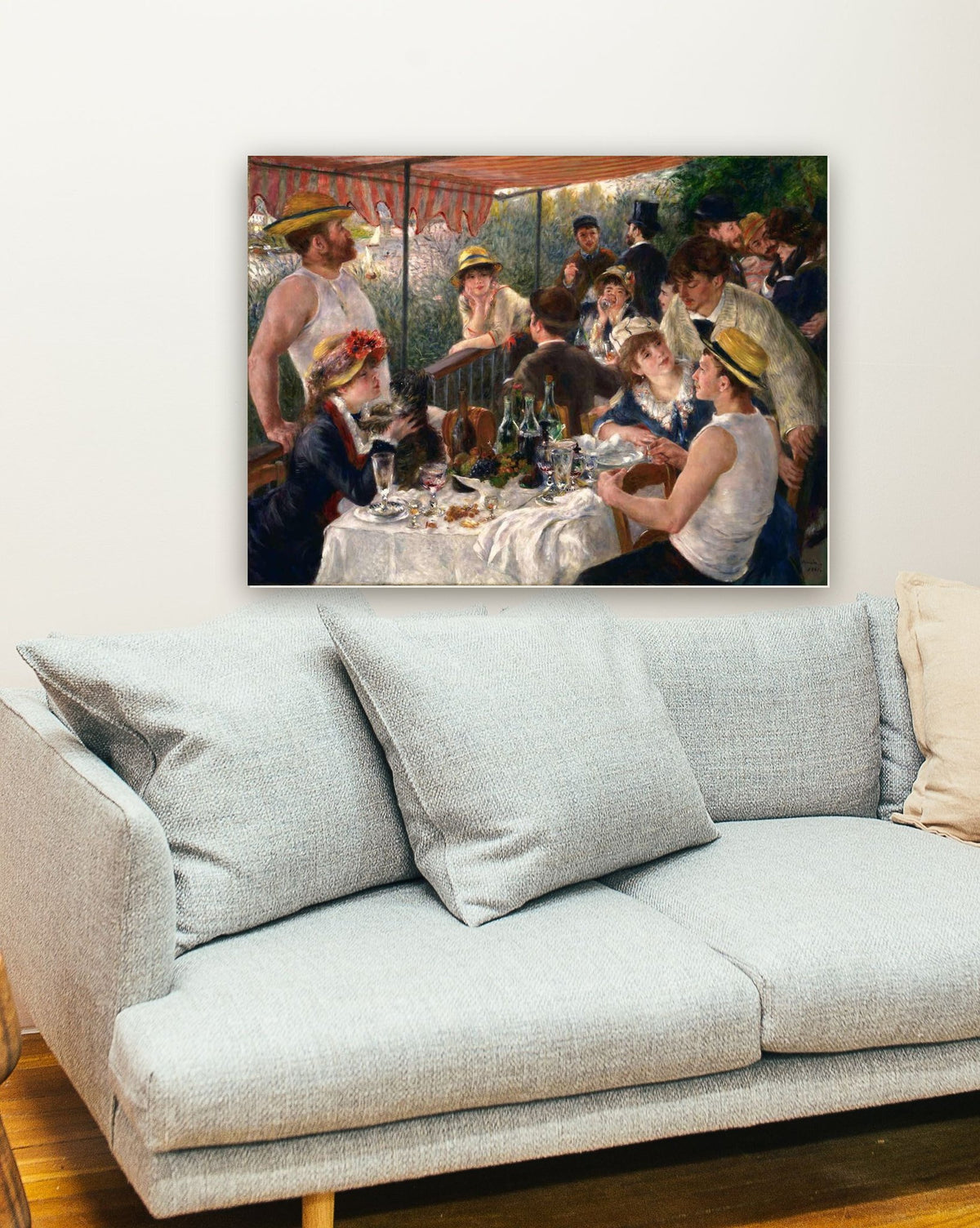 Almoço na Festa dos Barqueiros de Pierre-Auguste Renoir na parede de uma sala