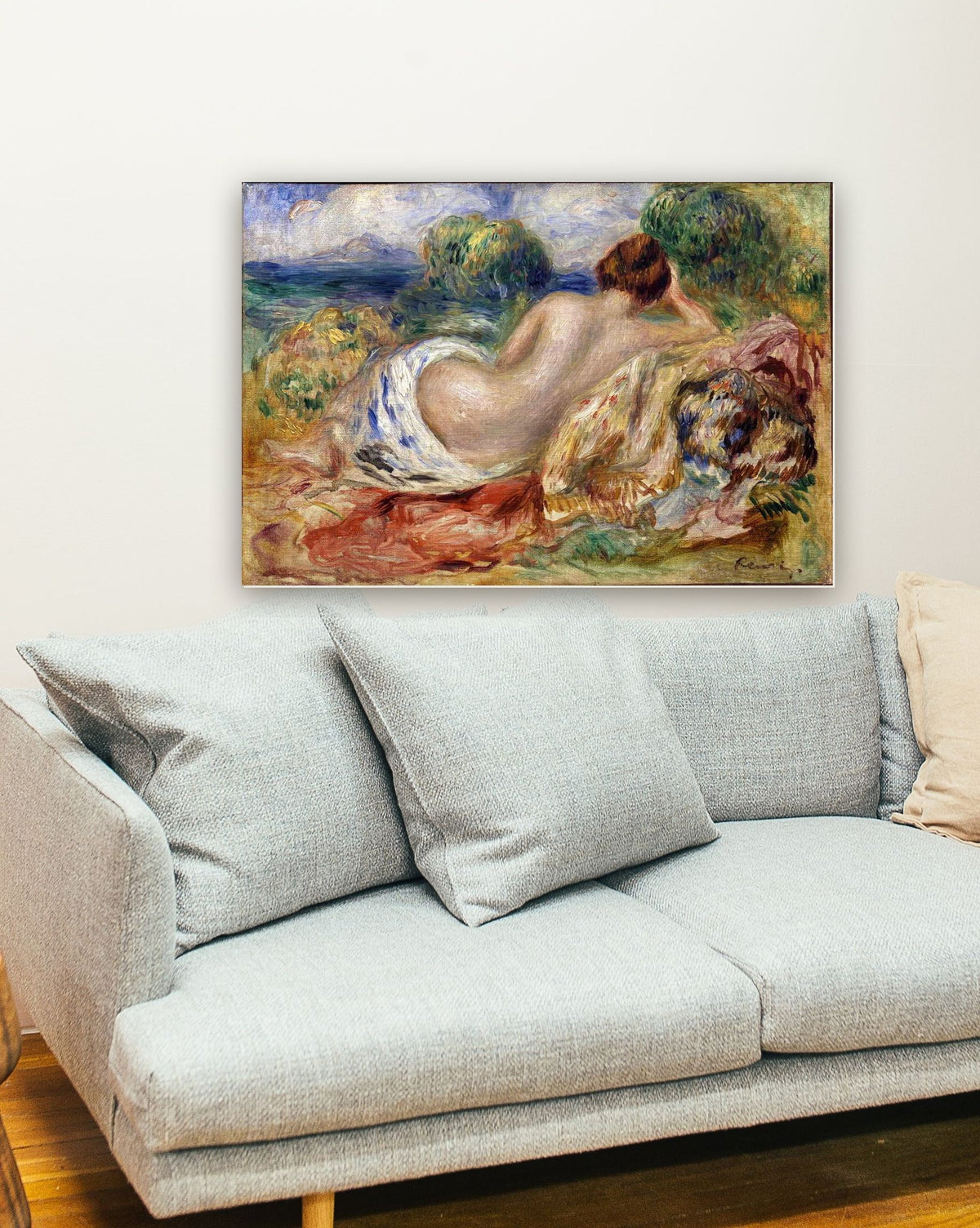 Nu na Paisagem de Pierre-Auguste Renoir na parede de uma sala