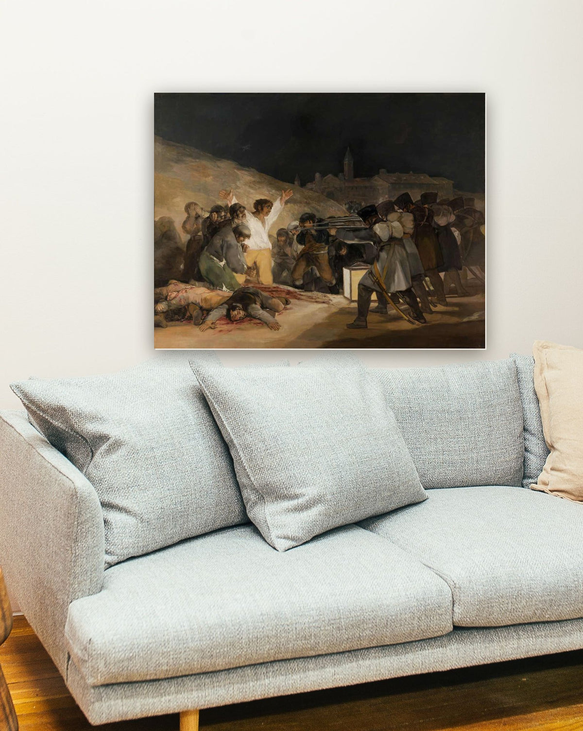 O 3 de Maio em Madri de Francisco de Goya na parede de uma sala